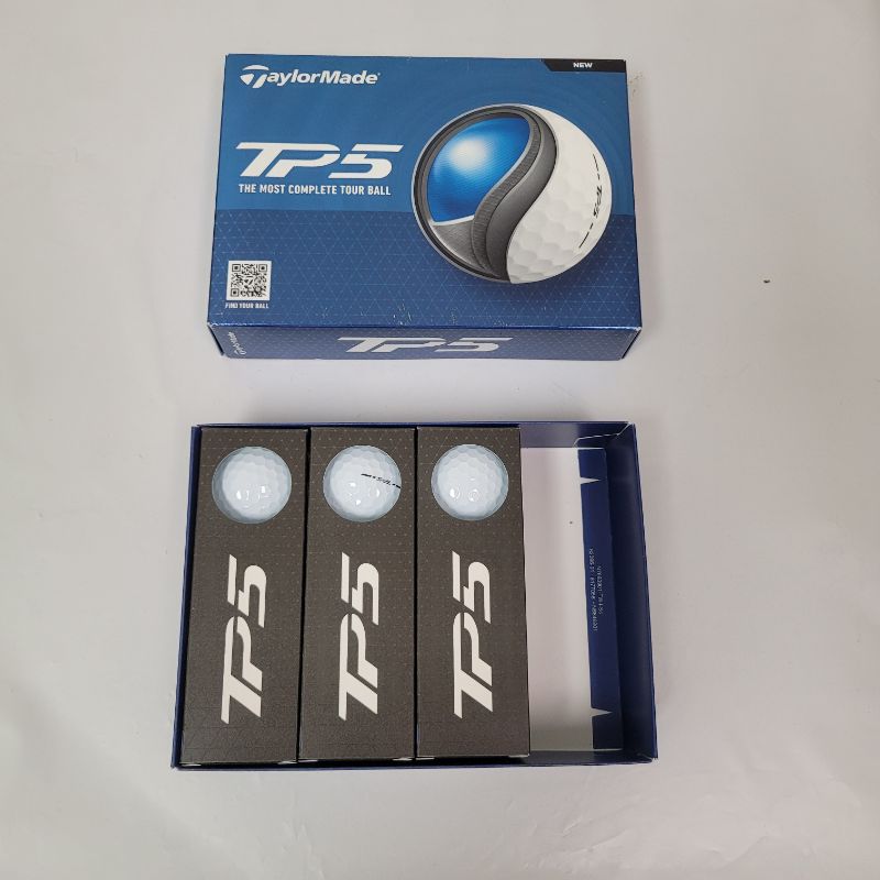 Photo 1 of At TaylorMade life is all about golf and trying new things. Like the new TP5/TP5x and its better aerodynamics improved green side spin and enhanced feel. 