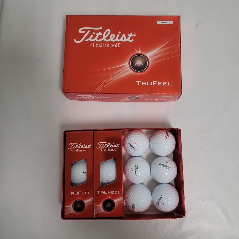 Photo 1 of ** Single  TEST ON PARTIAL SET ** Make sure you golf using the Titleist 2024 TruFeel Golf Balls 12-Pack if you prioritize a soft feel. The 2-piece construction creates low flying and low spinning speeds, and the 376 tetrahedral dimple count helps the ball
