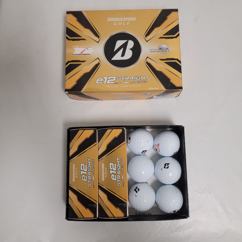 Photo 1 of ** Single  TEST ON PARTIAL SET ** Start achieving hole in ones with the Bridgestone Golf E12 Straight Golf Balls 12-Pack. Its Mindset technology offers a visual cue on the golf ball that reminds you of the easy three-step process. The 3-piece construction