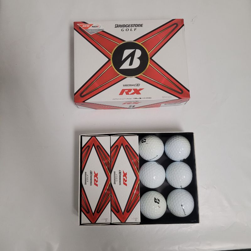 Photo 1 of ** Single  TEST ON PARTIAL SET ** Maximize your performance with the Bridgestone Golf 2024 Tour B-RX Golf Balls 12-Pack. The 3-piece design enhances spin for accuracy, while Reactiv X technology delivers intense rebound for long-distance flights.