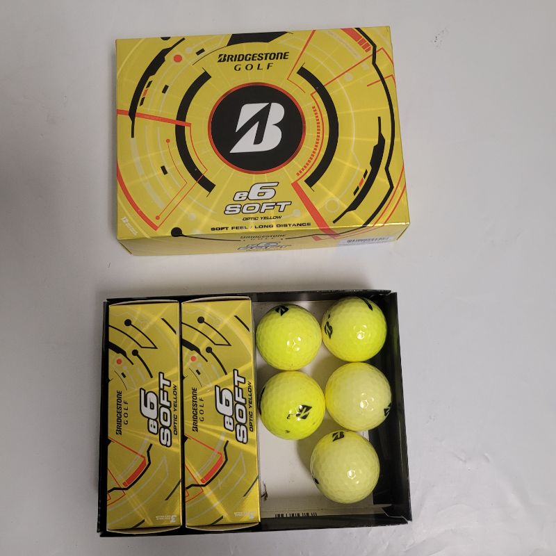 Photo 1 of ** Single  TEST ON PARTIAL SET **  Start achieving hole in ones with the Bridgestone Golf E6 Soft Golf Balls 12-Pack. Its 2-piece construction provides excellent distance, and the surlyn ionomer cover has 330 dimples to reduce drag and increase lift. Its 