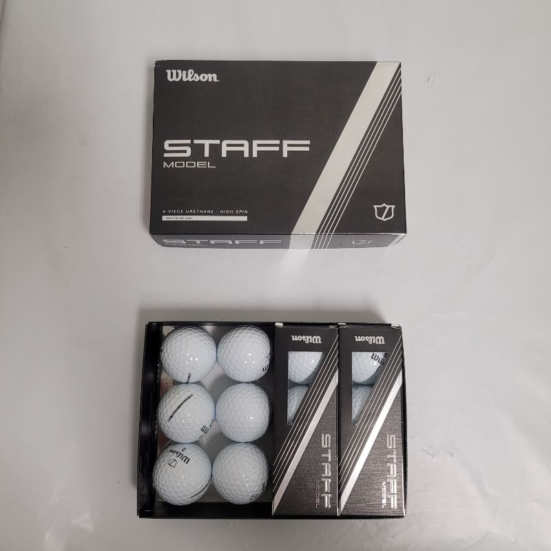 Photo 1 of ** Single  TEST ON PARTIAL SET **  Play with speed, precision and consistency when using the Wilson 2024 Staff Model Golf Balls 12-Pack. The medium compression V-CORâ¢ delivers maximum velocity for long-distance performance, while the thin urethane cover 