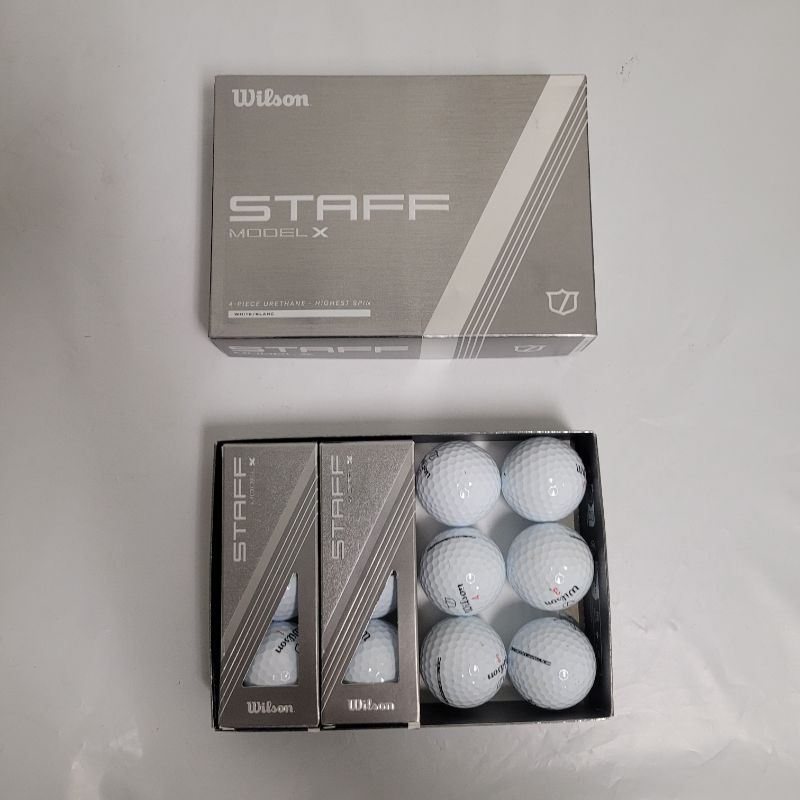 Photo 1 of ** Single  TEST ON PARTIAL SET **  Dress your tee up with the Wilson Staff Model X Golf Balls 12-Pack. Its v-cor and firm compression core delivers faster ball speeds. The urethane cover increases stopping power, and its 362-dimple pattern maximizes spin.