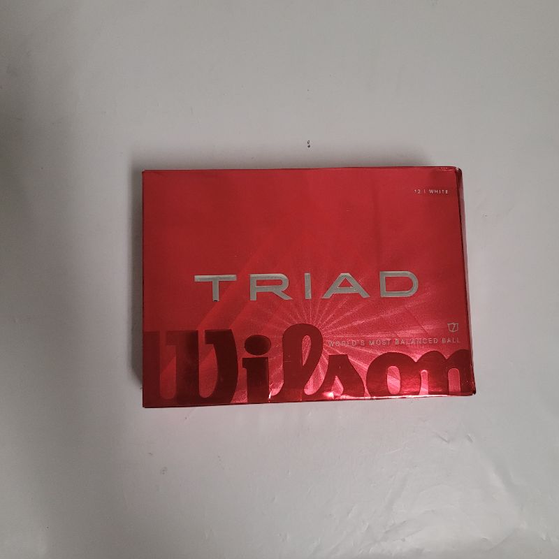 Photo 1 of ** Single  TEST ON PARTIAL SET **  The New & Improved Wilson Triad Golf Ball is a soft three-piece urethane golf ball that offers performance benefits to help the aspiring golfer find more fairways, attack more pins and sink more putts. The patented Tri-B