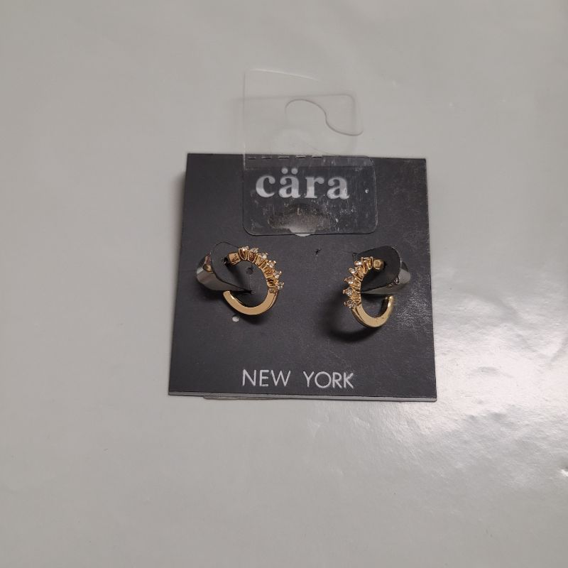 Photo 1 of Cara New York gold-plated huggie hoop earrings with cubic zirconia stones