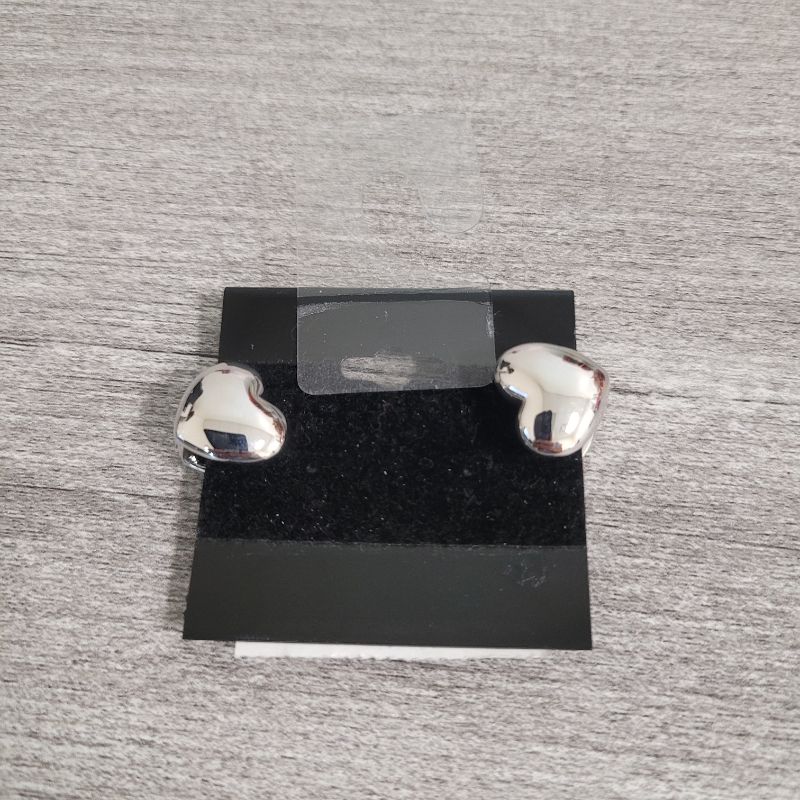 Photo 1 of Silver puffy heart clip-on earrings
