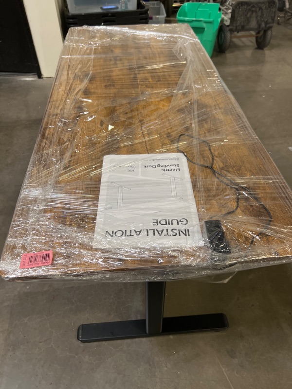 Photo 1 of Electric Adjustable Height Standing Desk, 55×24 Inches Sit Stand Desk with Power Socket, 2 USB Ports, 3 Power Outlets, 4 Wheels,4 Memory Buttons Home Office Computer Workstations
