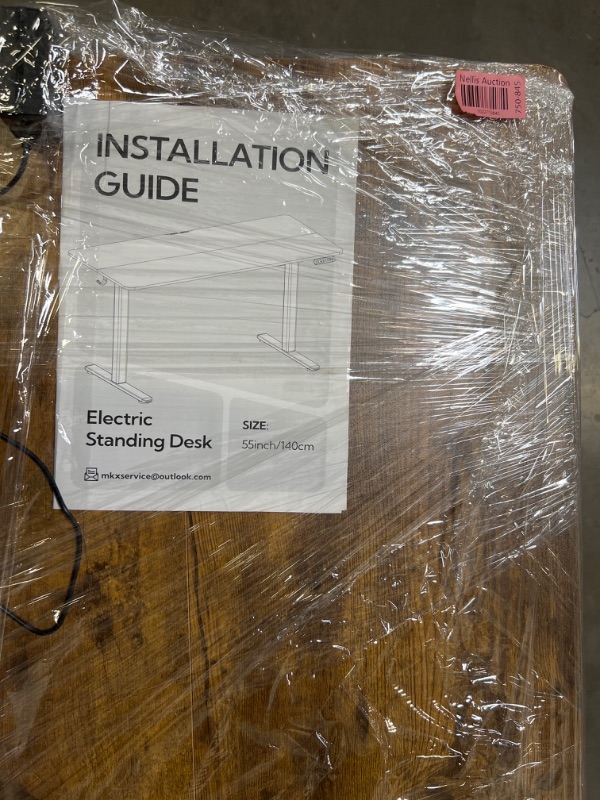 Photo 1 of Electric Adjustable Height Standing Desk, 55×24 Inches Sit Stand Desk with Power Socket, 2 USB Ports, 3 Power Outlets, 4 Wheels,4 Memory Buttons Home Office Computer Workstations
