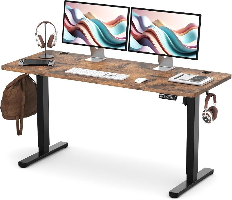 Photo 1 of Electric Adjustable Height Standing Desk, 55×24 Inches Sit Stand Desk with Power Socket, 2 USB Ports, 3 Power Outlets, 4 Wheels,4 Memory Buttons Home Office Computer Workstations

