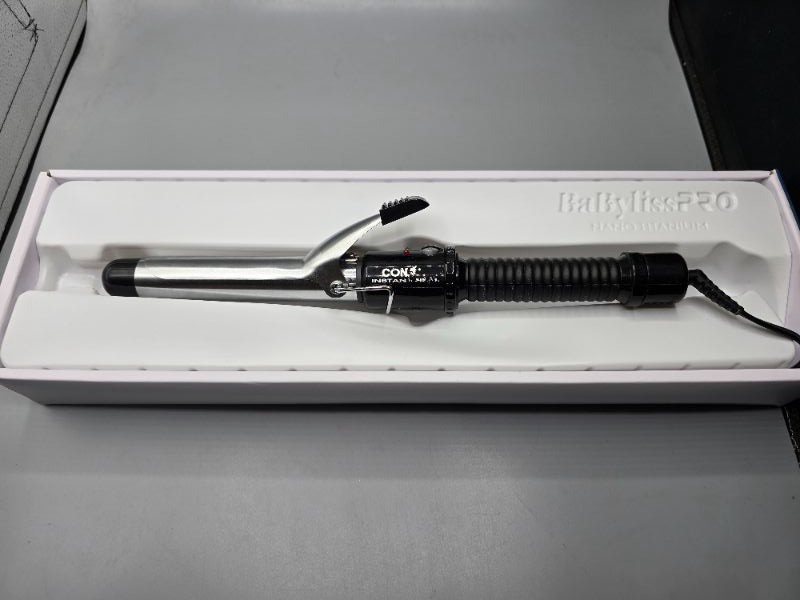 Photo 1 of Conair Instant Heat Curling Iron - 1": Metal Curling Iron, Suitable For All Hair Types