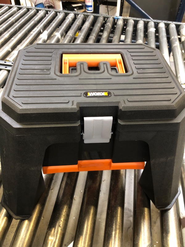 Photo 1 of worx step stool with storage compartment