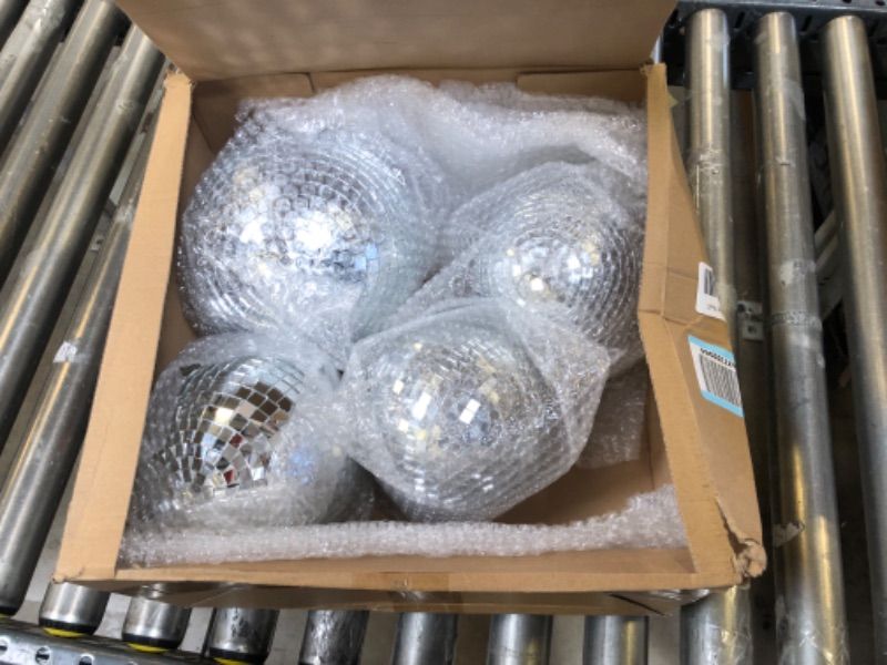 Photo 2 of 4 Pack Large Disco Ball Silver Hanging Disco Balls Reflective Mirror Ball Ornament for Party Holiday Wedding Dance and Music Festivals Decor Club Stage Props DJ Decoration (4 Inch, 20 Inch)