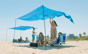 Photo 1 of AMMSUN BEACH SHADE TENT BEACH CANOPY PROVIDES 128 SQ. FT. OF SHADE
