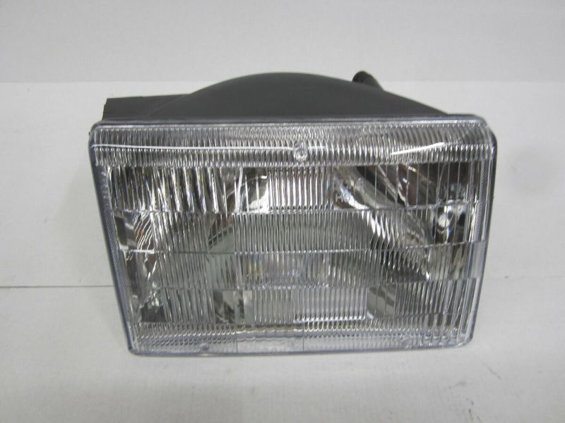 Photo 1 of Dorman 1590411 Passenger Side Headlight Assembly Compatible with Select Jeep Models