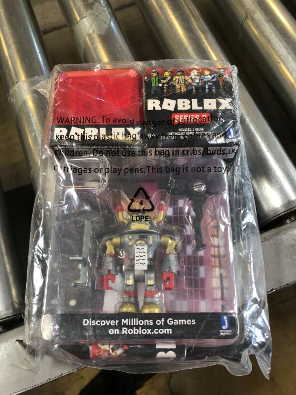 Photo 2 of Roblox Action Collection - Brainbot 3000 Figure Pack + Two Mystery Figure Bundle [Includes 3 Exclusive Virtual Items] Brainbot 3000 Action Collection