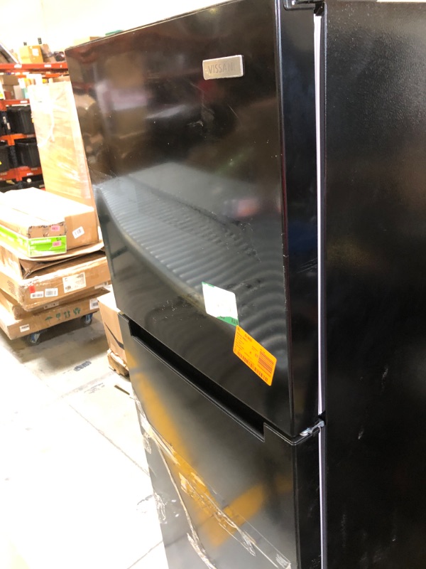 Photo 1 of black fridge 