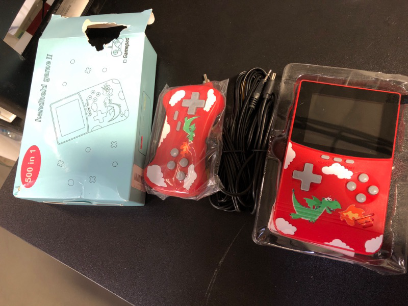 Photo 1 of hand held kids game 
