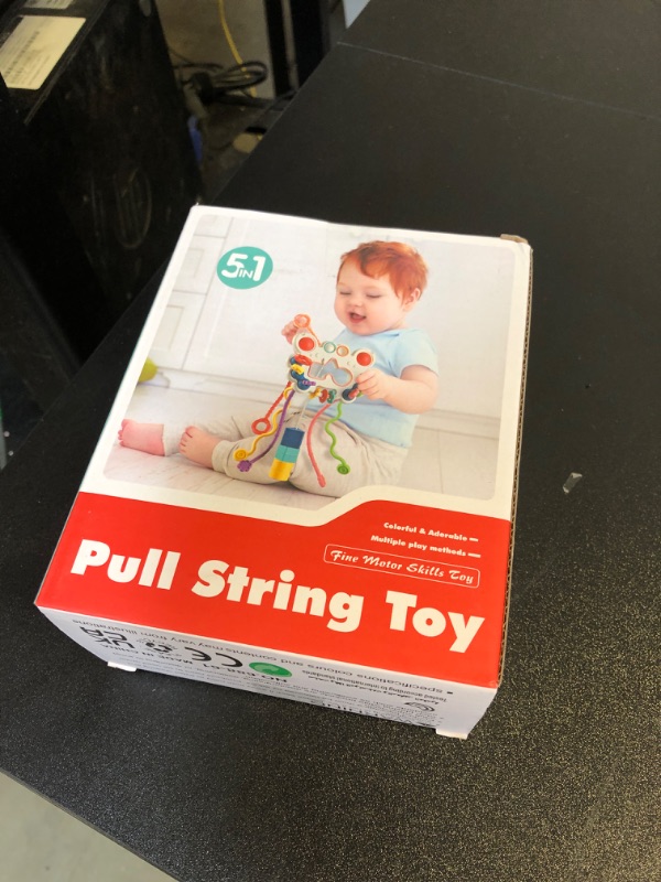 Photo 1 of Baby Montessori Toys for 18M+, Food Grade Silicone Pull String Activity Toy, Sensory Toys for Toddlers, Travel Toys for Babies, Baby Toys Fine Motor Skills Toys Gift for 18m+
