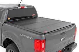 Photo 1 of 19-24 Ford Ranger 5ft Bed Hard Tri-Fold Flip Up Bed Cover - Rough Country
