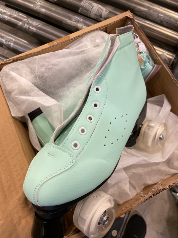 Photo 1 of teal rolling skates for girls size unknown