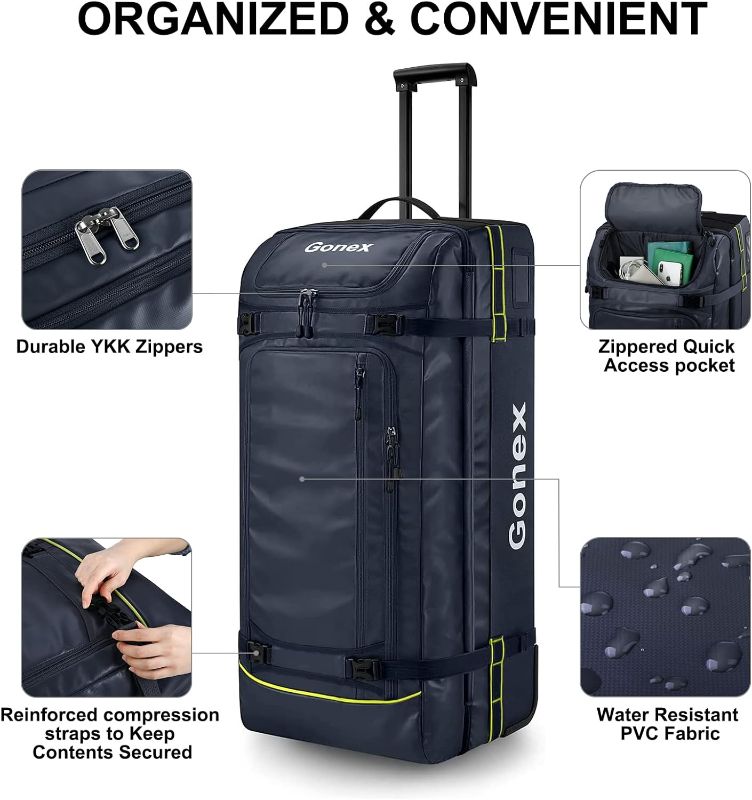 Photo 1 of Gonex Rolling Duffle Bag with Wheels, 100L Water Repellent Large Wheeled Travel Duffel Luggage with Rollers 33 inch, Navy Blue
