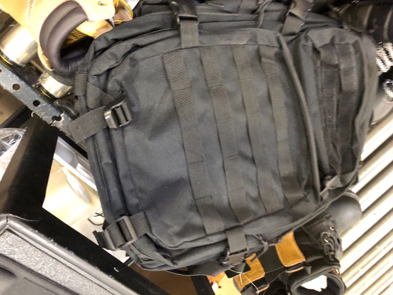 Photo 1 of black backpack