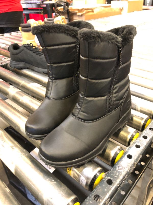 Photo 1 of black faux fur boots