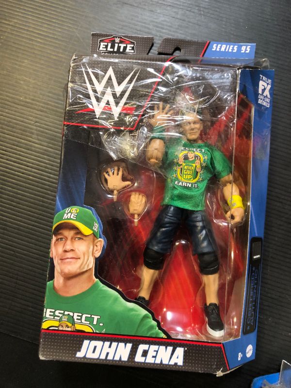 Photo 2 of Mattel WWE Top Picks Elite Action Figure & Accessories Set, John Cena 6-inch Collectible with Swappable Hands, Ring Gear & 25 Articulation Points
