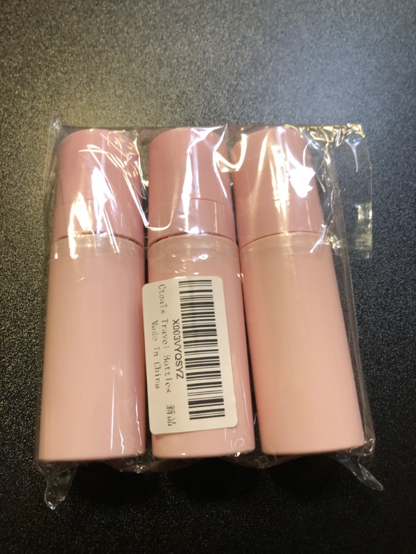 Photo 1 of 3pc pink travel bottles