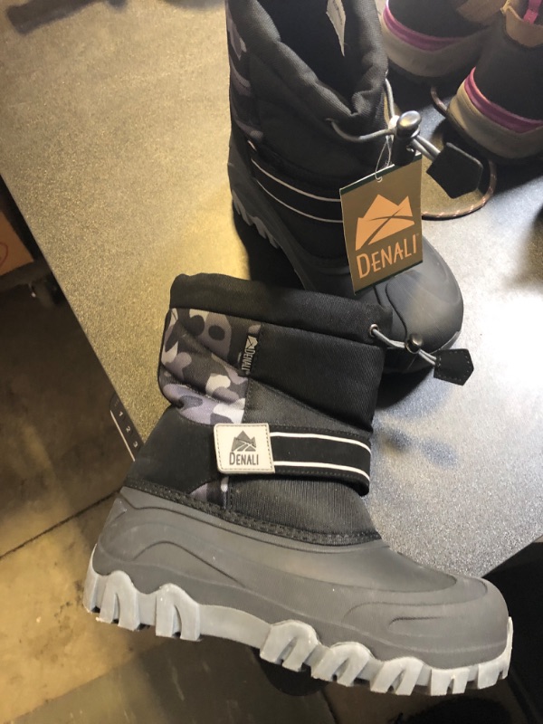 Photo 1 of DENALI WORN BUT LIKE NEW  SIZE TWO WITH CAMO PRINT ON BACK 