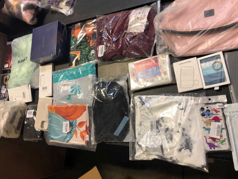 Photo 1 of MYSTERY BOX LOT FILLED WITH PHONE CASES CLOTHING DIARY PINK BLUE PINK BAGS ETC NO RETURNS ORE XCHANGES SOLD AS IS