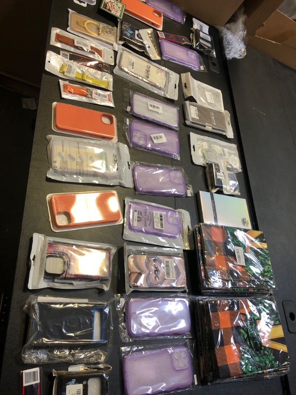 Photo 1 of MYSTERY BOX LOT FILLED WITH PHONECASES AND WATCH BANDS NO RETURN OR EXCHANGES 