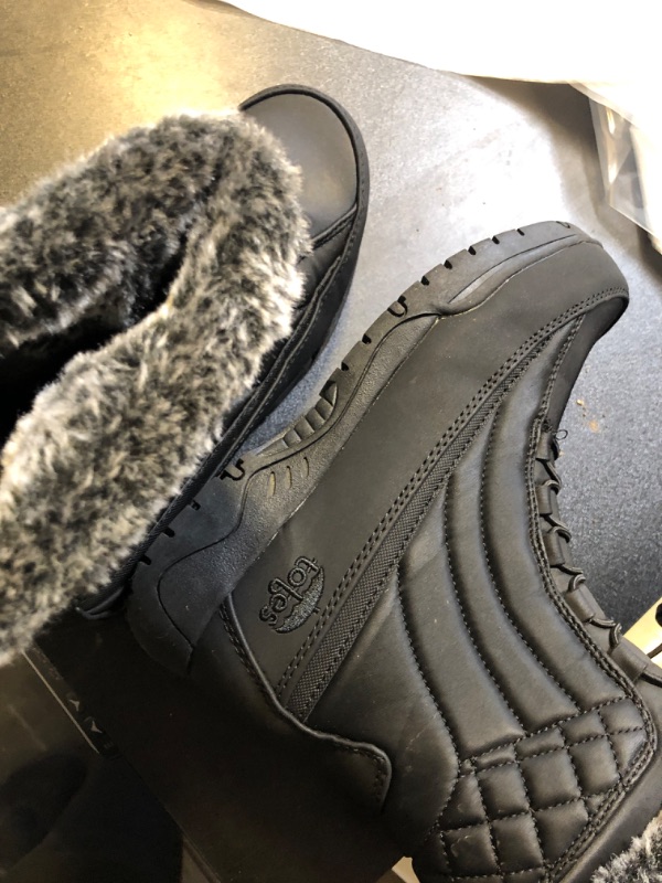 Photo 1 of BLACK SNOWBOOTS 7 WITH SIDE ZIPPER AND FUR USED BUT LIKE NEW 