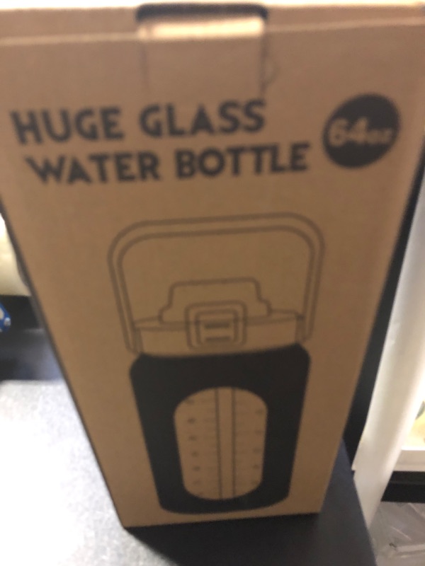Photo 1 of 64oz Glass Water Bottle with Straw Lid Half Gallon Motivational Bottle with Handle and Silicone Sleeve and Time Marker Large Reusable Sports Water Jug for...
