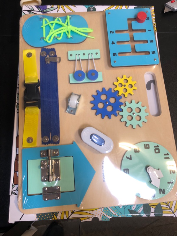 Photo 1 of Busy Board for Toddlers 1 2 3 4, Montessori Activity Board with 10 Learning Activities, Toddler Gifts, Sensory Wooden Board for 1 Year Old
