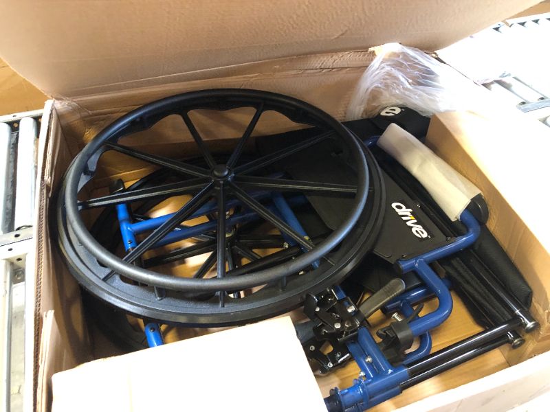 Photo 2 of Drive Medical BLS18FBD-ELR Blue Streak Lightweight Wheelchair with Swing-Away Elevating Leg Rests and Flip-Back Arms 18 Inch Elevating Leg Rests