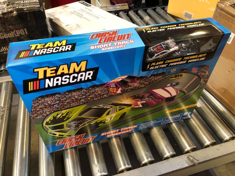 Photo 3 of Far Out Toys NASCAR Crash Circuit Short Track Speedway | 2 Electric Powered Cars, 2 Flash Chargers, 6 Driver and Pit Crew Figurines, 3.7 Ft Assembled | Capture The Momentum and Thrill of Nascar