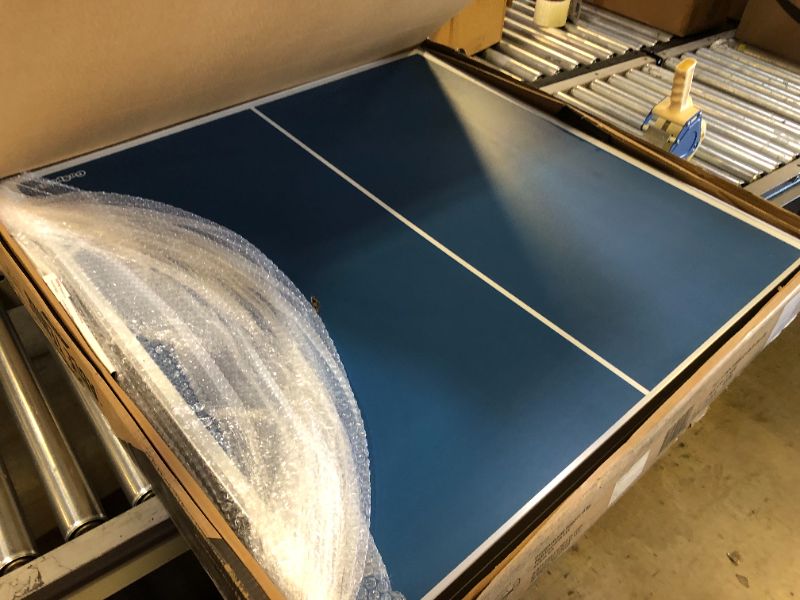 Photo 1 of GoSports Mid-Size Table Tennis Game Set - Indoor/Outdoor Portable Table Tennis Game with Net, 2 Table Tennis Paddles and 4 Balls Blue Table