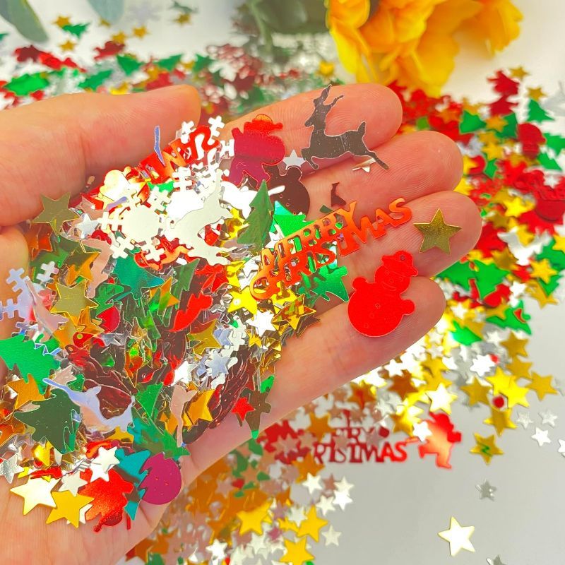 Photo 1 of 2000PCS Christmas Table Glitter Confetti Mix Foil Snowflake,Pentagram,Santa Claus,Pine, Merry Christmas Alphabet,Elk,Christmas Tree Confetti for Christmas Party Decoration