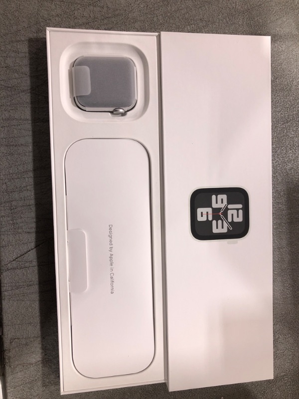 Photo 1 of Apple Watch SE (2nd Gen) [GPS 40mm] Smartwatch with Silver Aluminum Case with Storm Blue Sport Band S/M. Fitness & Sleep Tracker, Crash Detection, Heart Rate Monitor Silver Aluminum Case with Storm Blue Sport Band 40mm S/M - fits 130–180mm wrists
