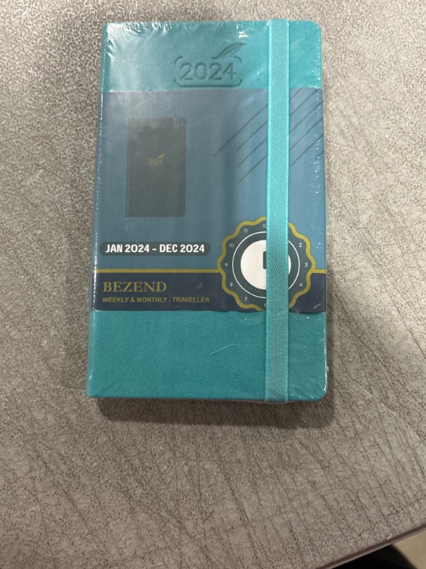 Photo 2 of Pocket 2024 Planner by BEZEND, Small Calendar for Purse 3.5" x 6", Daily Weekly and Monthly Agenda with Pen Holder, Vegan Leather Hard Cover - Turquoise [amazon]