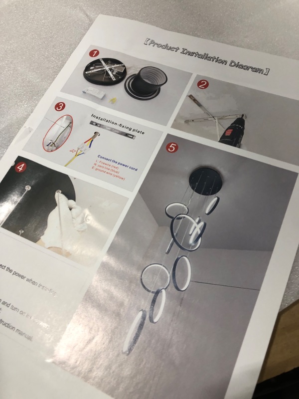 Photo 1 of Modern Led Chandelier Lighting,Dimmable with Remote Control 10 Rings Black Pendant Light Adjustable Height Hanging Ceiling Light Fixture,for Staircase Foyer High Ceiling Living Room 10- Lights