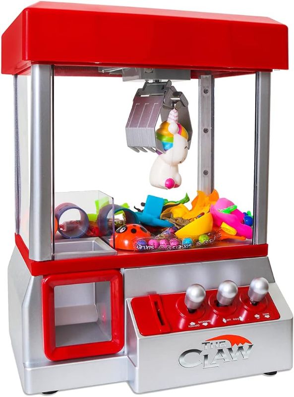 Photo 1 of Bundaloo Claw Machine Arcade Game with Sound, Cool Fun Mini Candy Grabber Prize Dispenser Vending Toy for Kids, Boys & Girls
