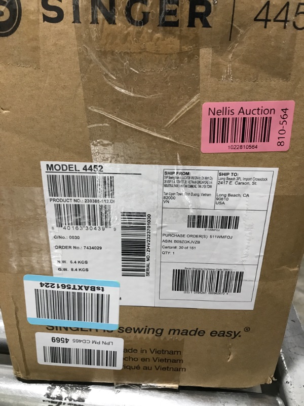 Photo 1 of SINGER | Heavy Duty Holiday Bundle - 4452 Heavy Duty Sewing Machine with Bonus Extension Table for Larger Projects, Packed with Specialty Accessories Gray