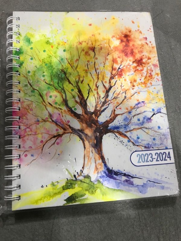 Photo 2 of Hardcover Academic Year 2023-2024 Planner: (July 2023 Through June 2024) 8.5"x11" Daily Weekly Monthly Planner Yearly Agenda. Bookmark, Pocket Folder and Stickers Set (Tree Seasons)
