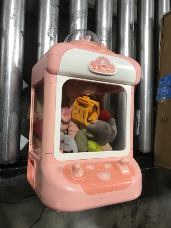 Photo 2 of Claw Machine for Kids,Mini Vending Machines Candy Grabber Prize Dispenser Toys for Girls, Boys Electronic Arcade Claw Game Machine for Party Birthday Easter Gifts with Lights Sound&20 Mini Plush Toys