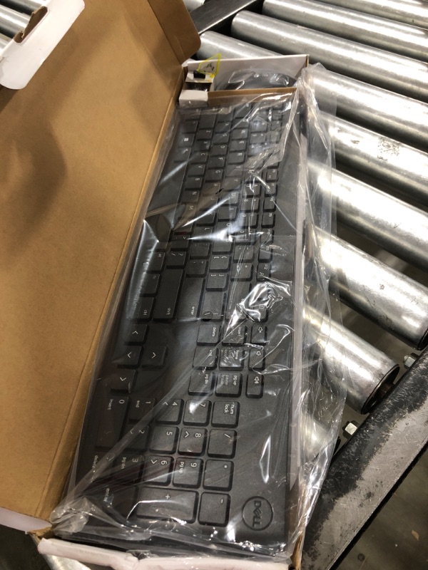 Photo 1 of Dell Wireless Keyboard and Mouse - KM3322W, Wireless - 2.4GHz, Optical LED Sensor, Mechanical Scroll, Anti-Fade Plunger Keys, 6 Multimedia Keys, Tilt Leg - Black