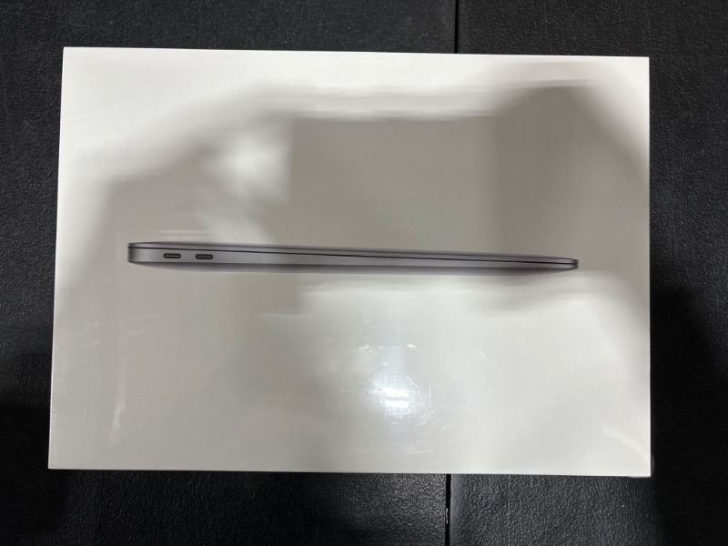 Photo 4 of Apple 2020 MacBook Air Laptop M1 Chip, 13" Retina Display, 8GB RAM, 256GB SSD Storage, Backlit Keyboard, FaceTime HD Camera, Touch ID. Works with iPhone/iPad; Space Gray 256GB Space Gray - FACTORY SEALED - OPENED FOR PICTURES 