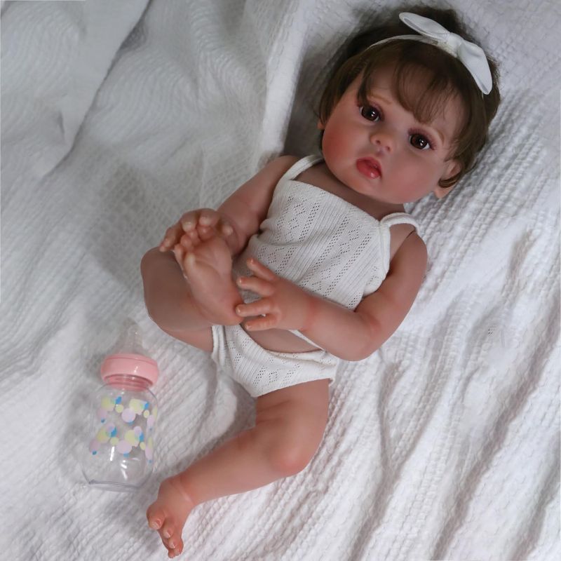 Photo 1 of CHAREX Reborn Baby Girl Doll Vinyl Full Body, 18 Inch Lifelike Waterproof Newborn Baby Doll, Realistic Washable Reborn Toddler Lucy, Amazing Gift Set for Kids Age 3+ 