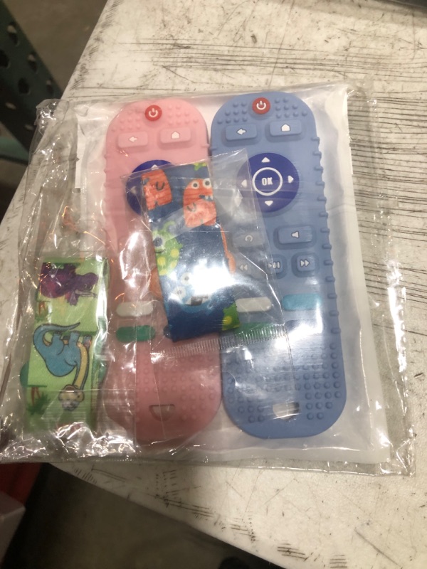 Photo 1 of BABY REMOTE TEETHING TOY 2PCS